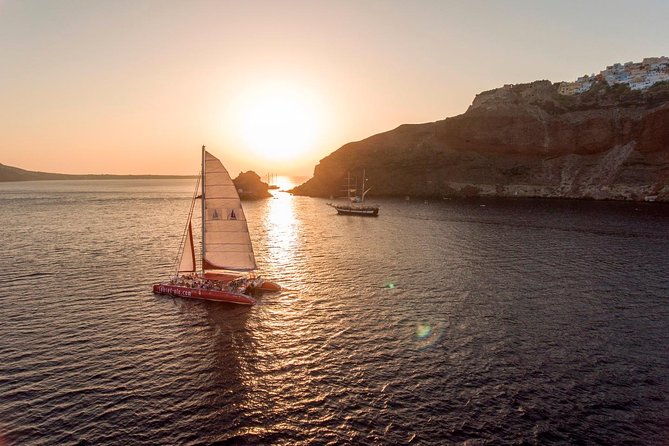 Sunset Sailing Catamaran Cruise in Santorini with BBQ and Drinks - A Santorini sunset cruise built around real water time