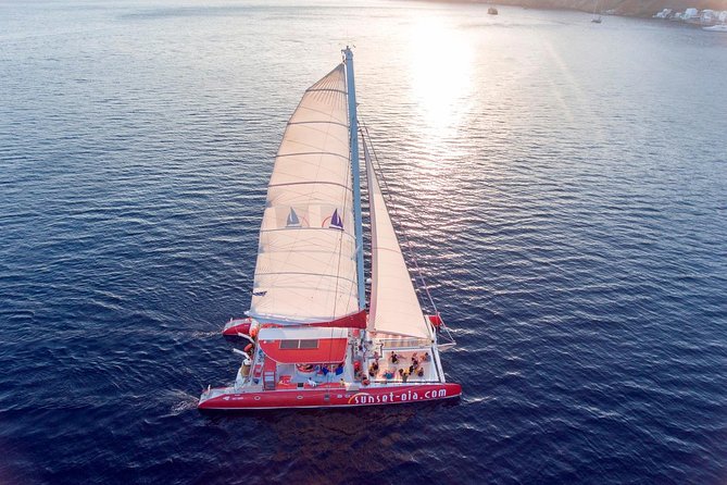 Sunset Sailing Catamaran Cruise in Santorini with BBQ and Drinks - White Beach BBQ stop: your longest stretch on board