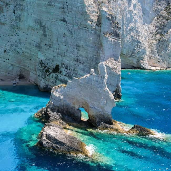 Zakinthos: Shipwreck Beach and Blue Caves Land and Sea Tour - The 2000-year olive tree moment: small stop, big local flavor