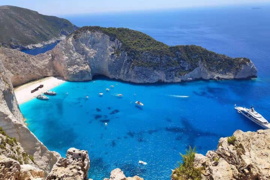 Zakynthos Small Group Tour Shipwreck & Blue Caves Land & Sea - Navagio viewpoint and Shipwreck Beach from two angles